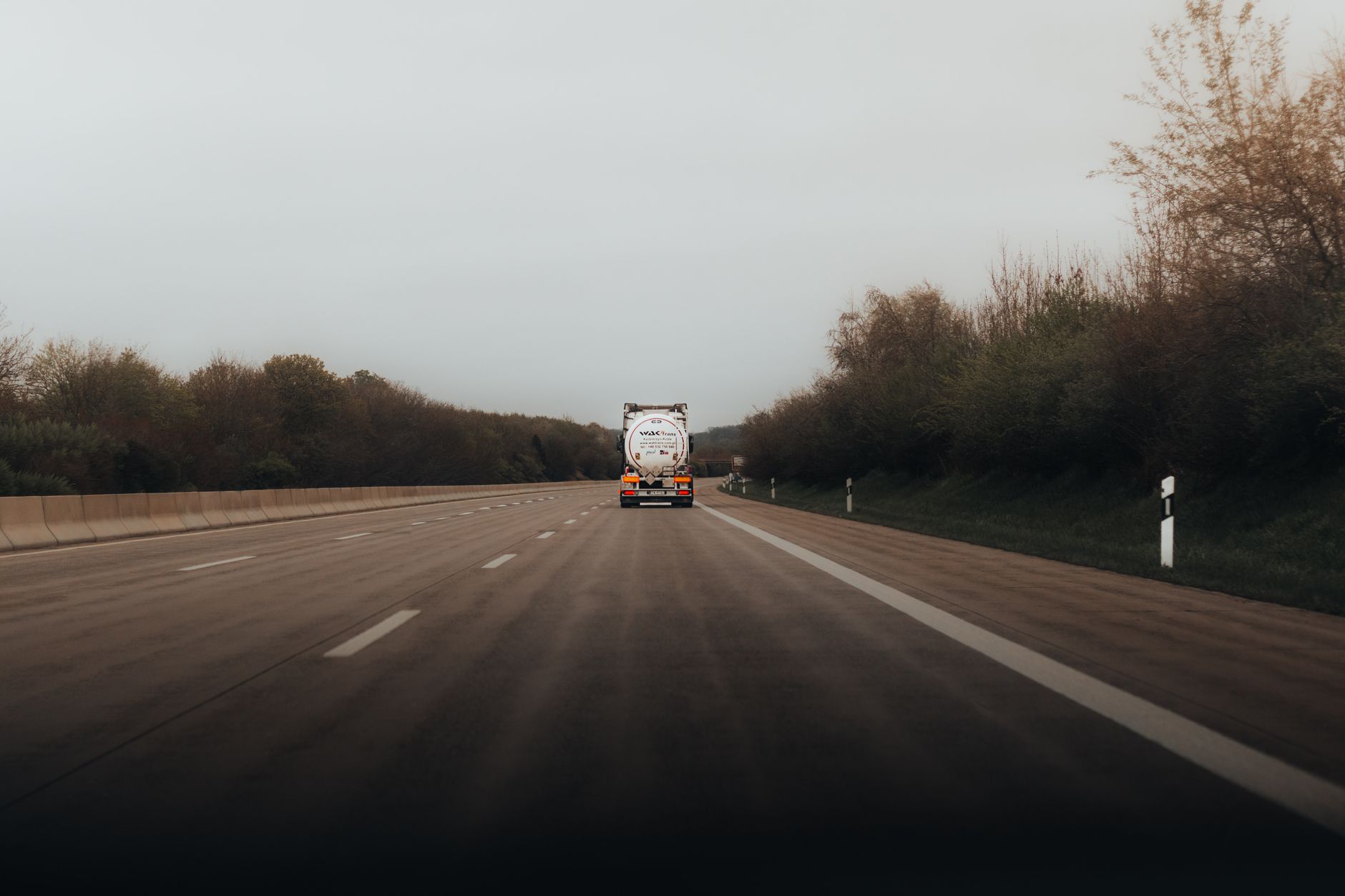 Tow truck driving on a highway