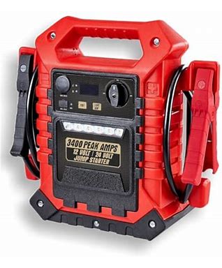 Jumper cables attached to a car battery