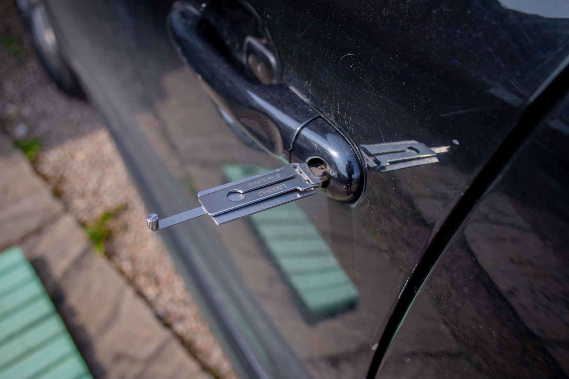 Professional unlocking a car door