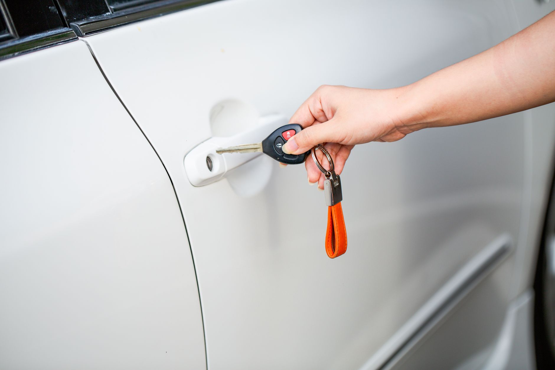 Frustrated driver trying to open a locked car door