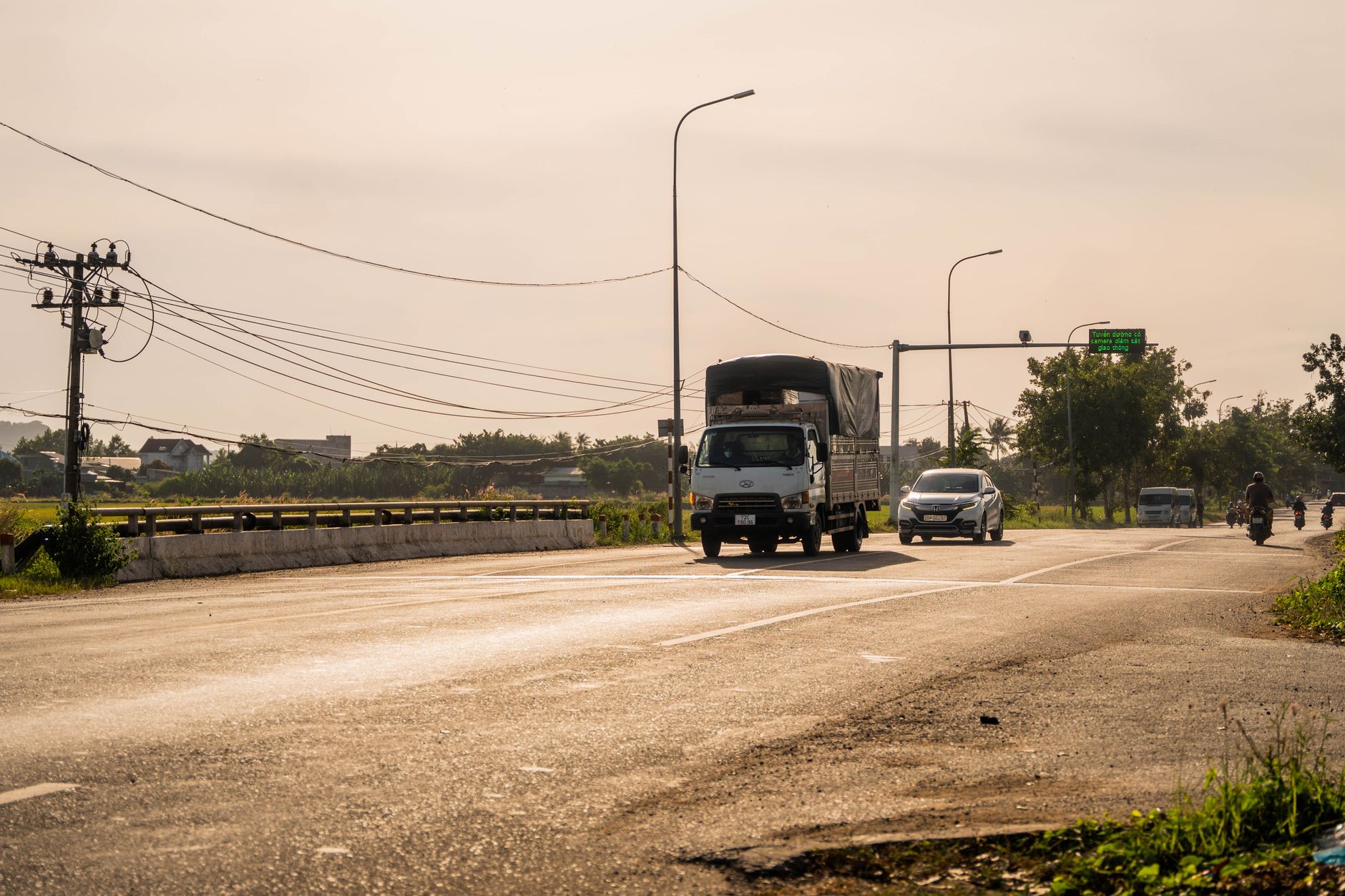 Rural road with vehicles
