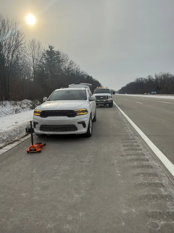 Tire change on side of freeway